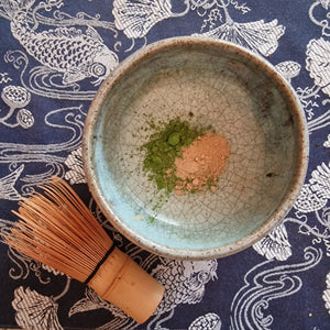 Chasen for whisking a chawan with matcha gaba green tea blended with calming organic reishi powder